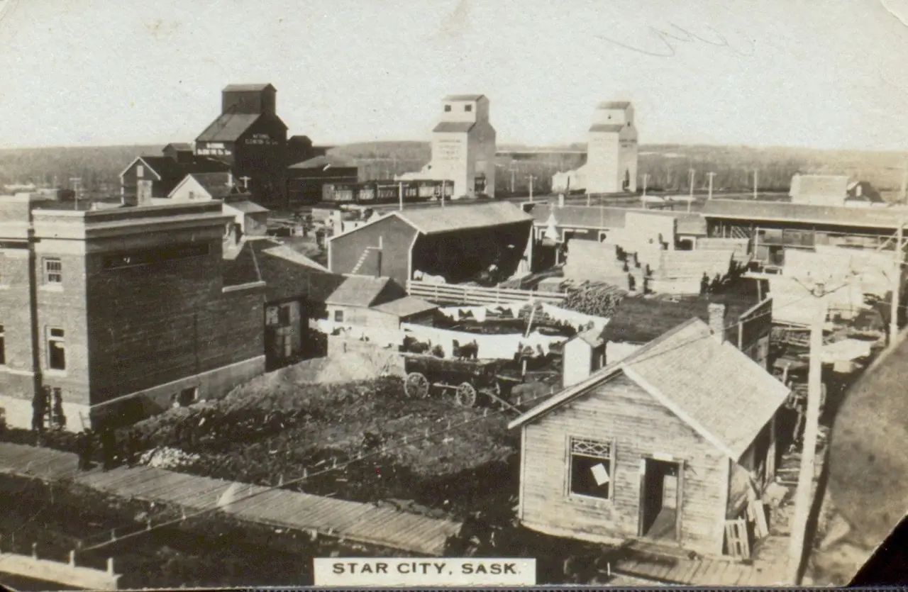 Star City from above, with grain elevators and boardwalk, about 1910